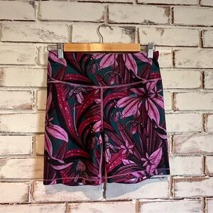 Janji floral orchid groundwork compression bike shorts